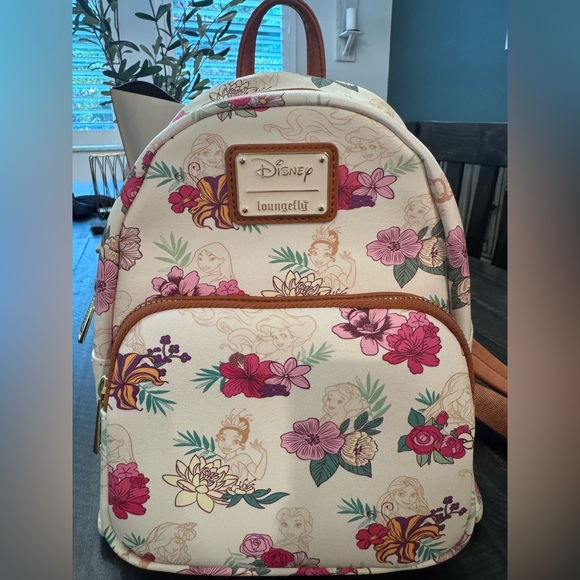 Loungefly Handbags - Loungefly Cream Mini Backpack with Pink & Purple Floral Print